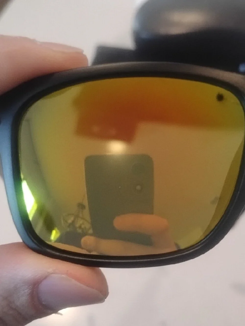 Oakley Matte Black Sunglasses with Yellow-Orange Mirror Lenses